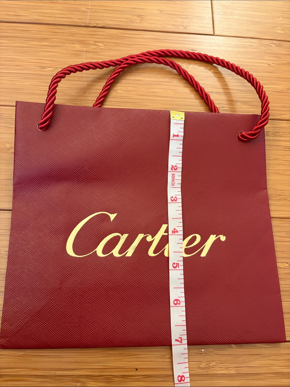 Cartier Burgundy Tote with Gold Logo and Red Rope Handles